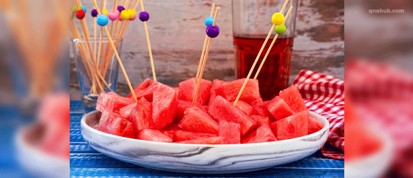 fresh-sweet-watermelon-on-a-serving-plate-with-chopsticks
